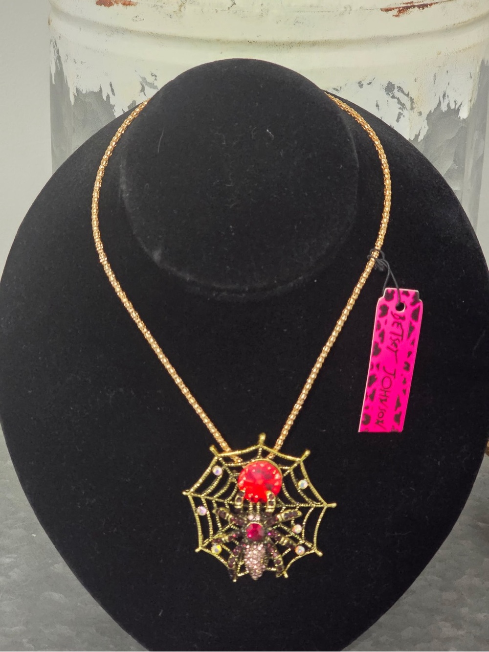 Gold Spider Web Pendant Necklace with Red Accents by Betsey Johnson